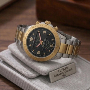 Two-tone watch with gold and silver band on a gray cushion, brand 'ALFAJR' visible