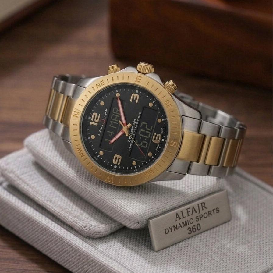 Two-tone watch with gold and silver band on a gray cushion, brand 'ALFAJR' visible